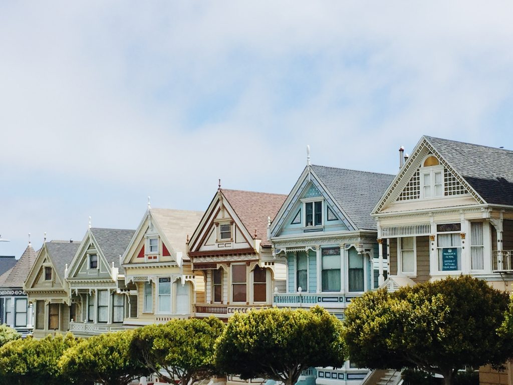 Homes with different colors lined in a row